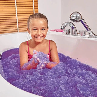 Child playing with Zimpli Smelli Gelli Baff Bubblegum in the bath, enjoying the colourful, sensory goo as it transforms the water.