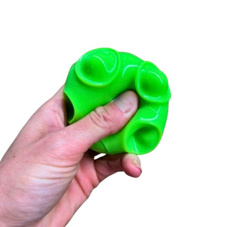 Squeeze and pop sensory ball