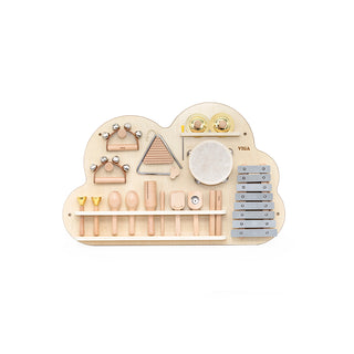 A wooden wall toy with percussion instruments