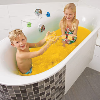 Two kids playing in a bath filled with Zimpli Smelli Gelli Baff Tutti Frutti, enjoying the colourful, sensory goo and bubbly bath experience.